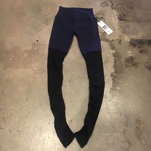 alo high waist goddess legging navy / black